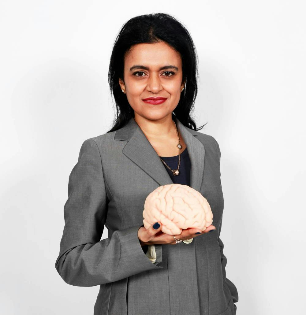 Tara Swart holding a brain
